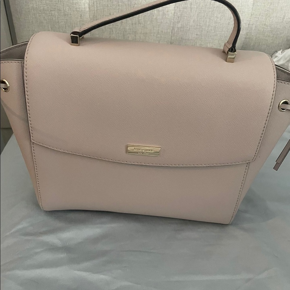 New With Out Tags it comes with a Dust Bag.